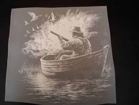 Black out hunter in boat/birds