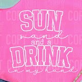 Sun, sand and a drink in my hand